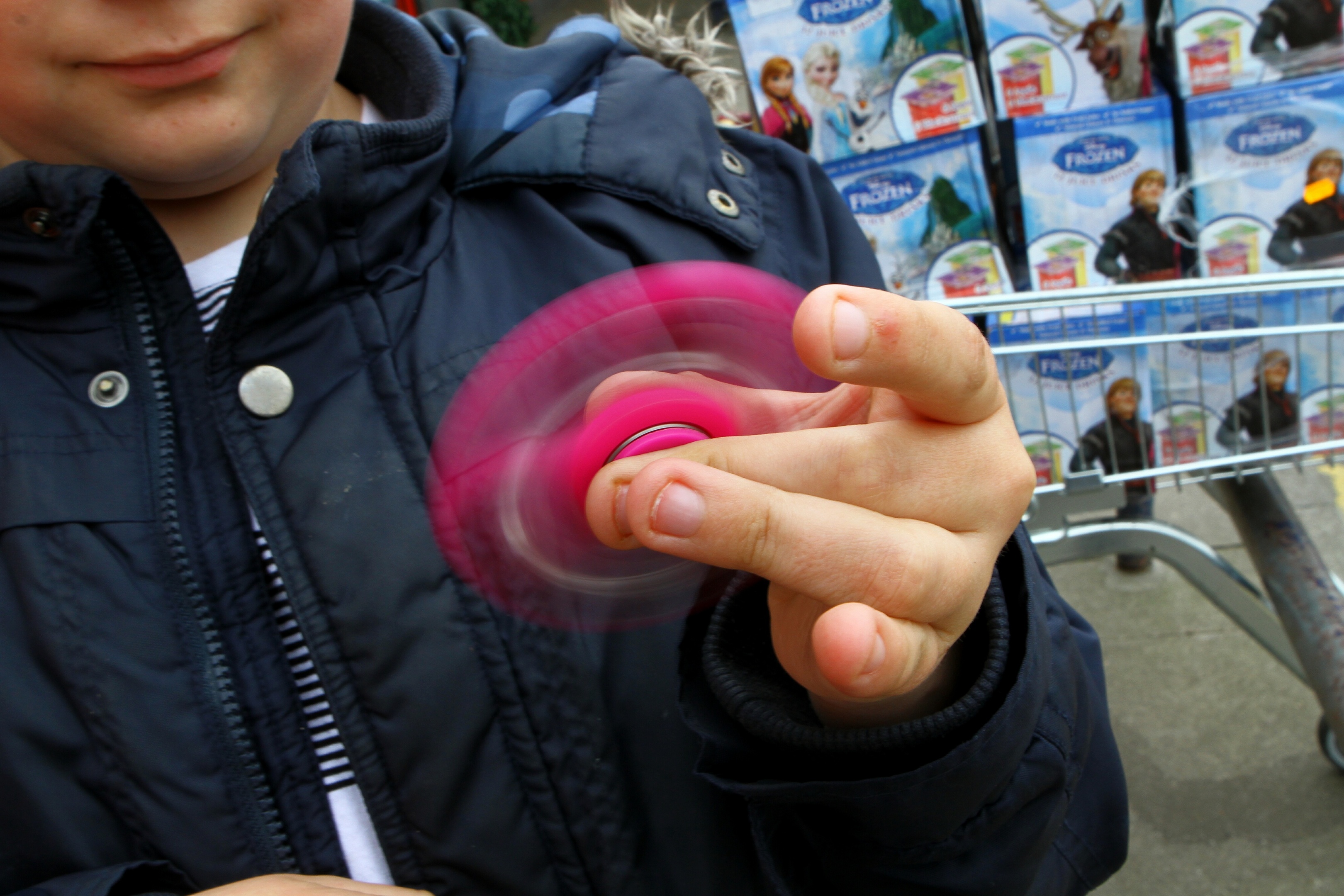 Finlay Kimmmet, age 12, with his fidget spinner, outside Hayat's Store in Hapyhillock.