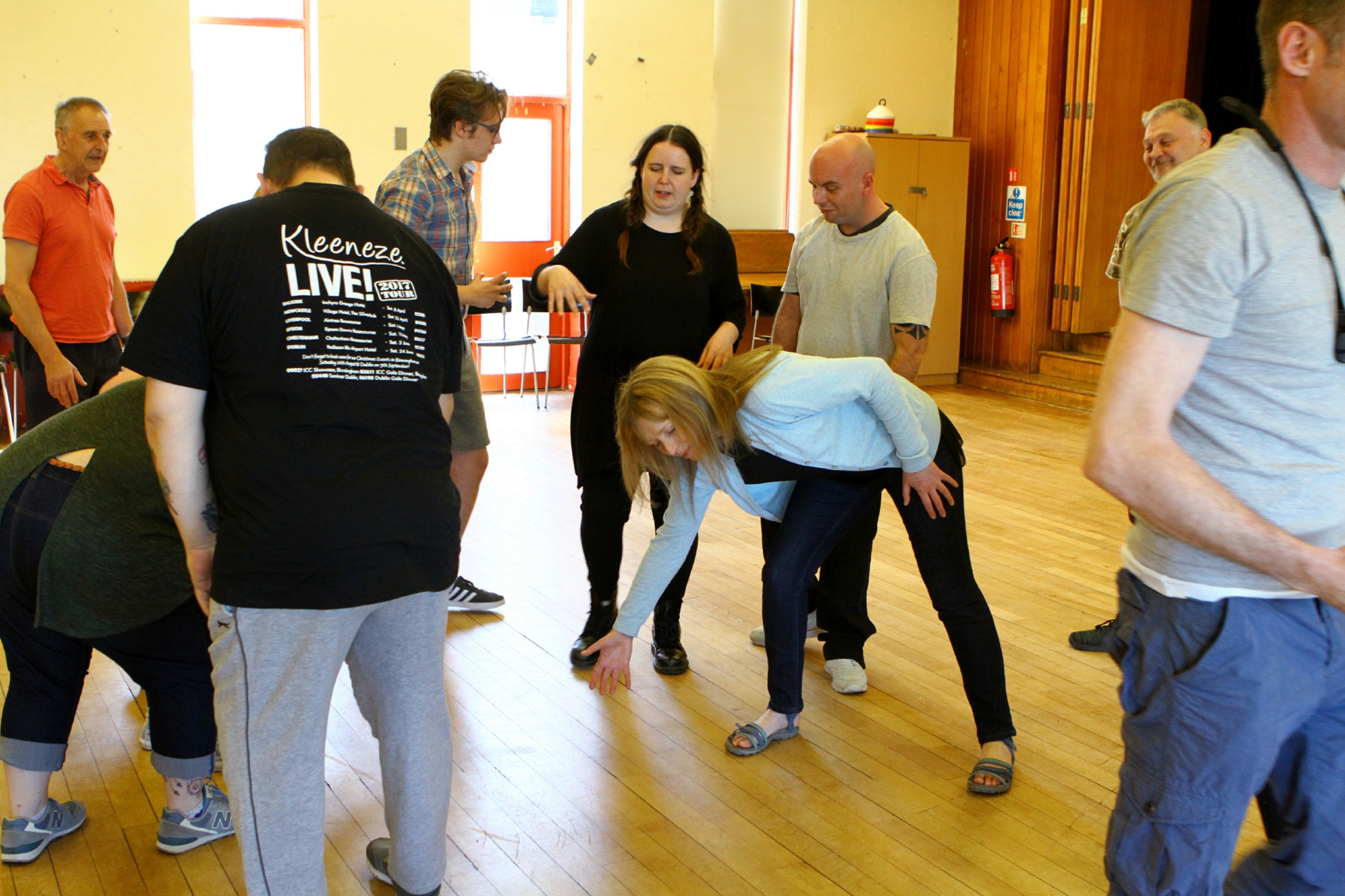 Participants in the Stand Easy project get involved in some warm-up games.