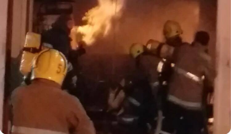 The firefighters were saved by their helmets and breathing apparatus.