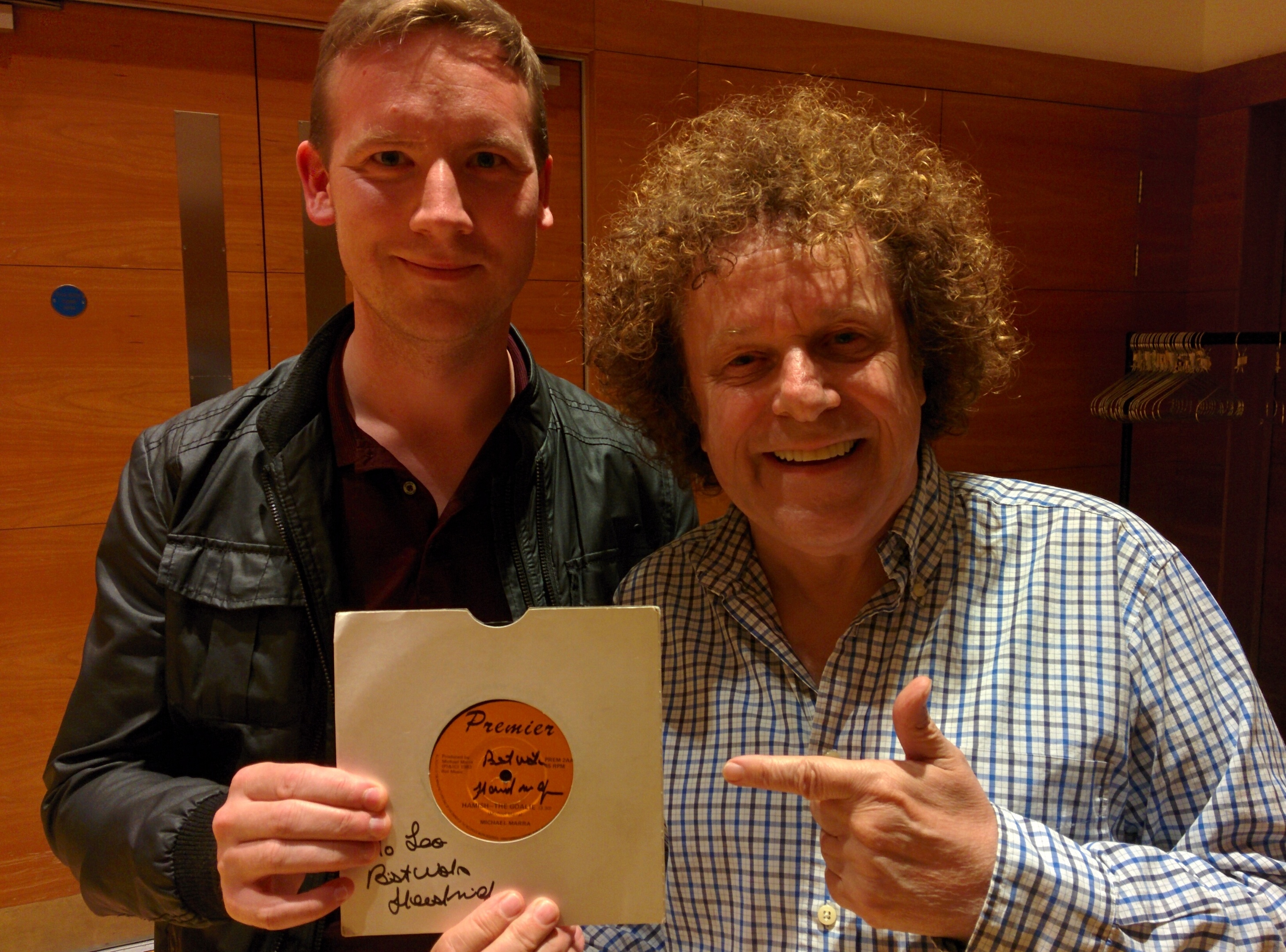 Leo Sayer was presented with the Michael Marra vinyl record by Courier reporter Graeme Strachan before his Perth concert on Saturday.