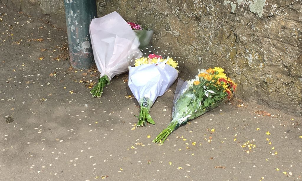 Flowers left at the scene of the tragedy.