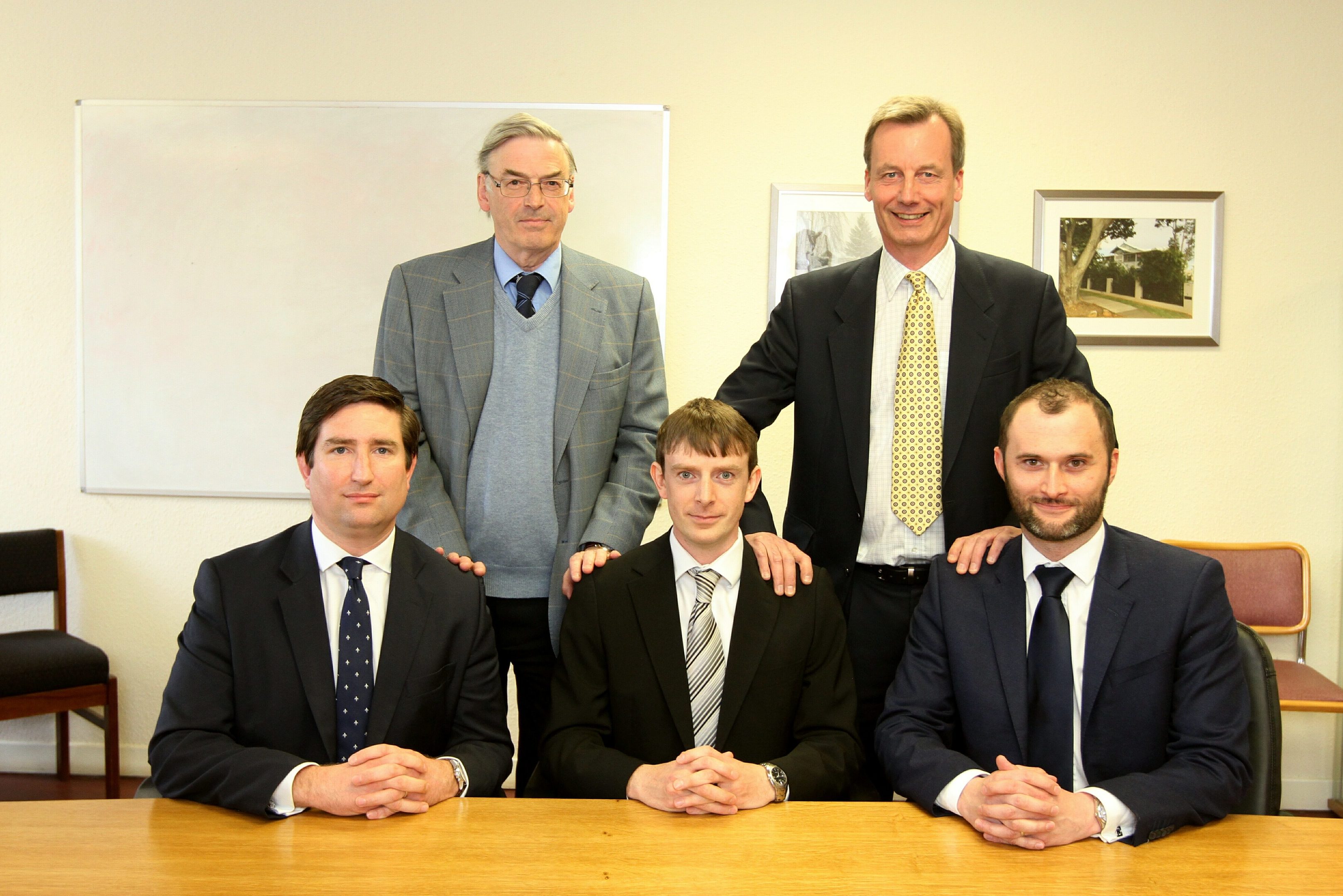 Seated are the new J&D Wilkie board of Roger McGill (Finance Director), Hamish Roweuan (joint Managing Director) and Jean- Christophe Gravier(joint Managing Director), with the old board standing of Mike Rowan and Bob Low.
