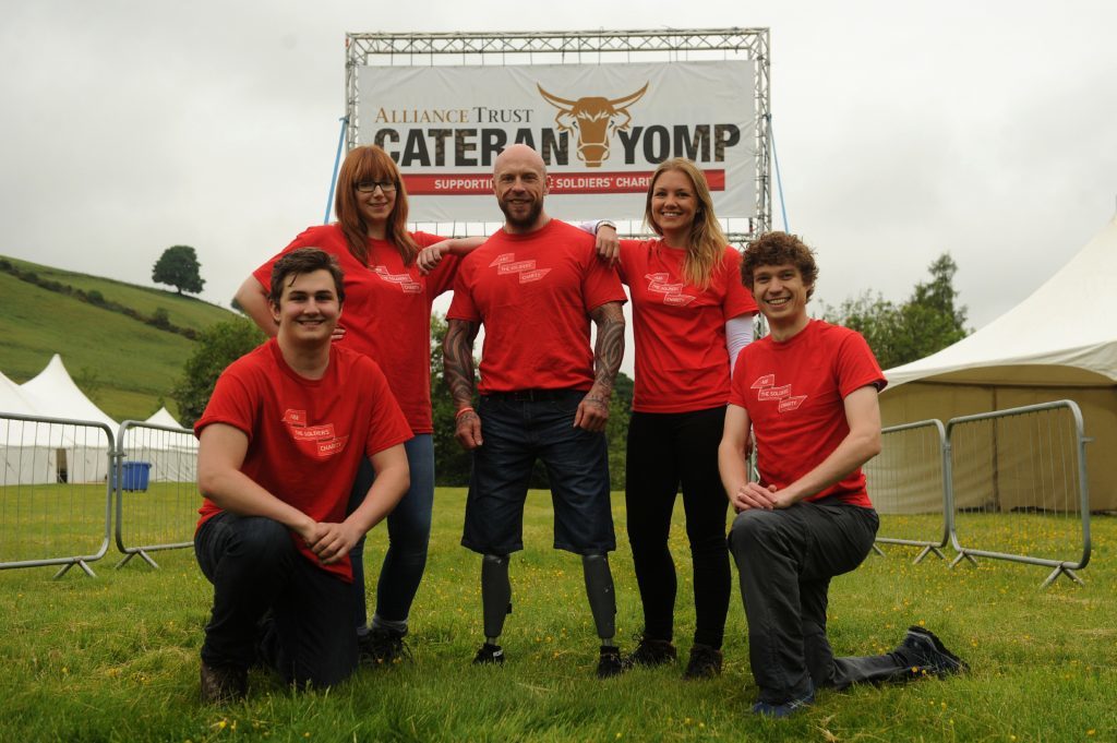 Last year's Yomp ambassador, para-athlete Micky Yule, with supporters.