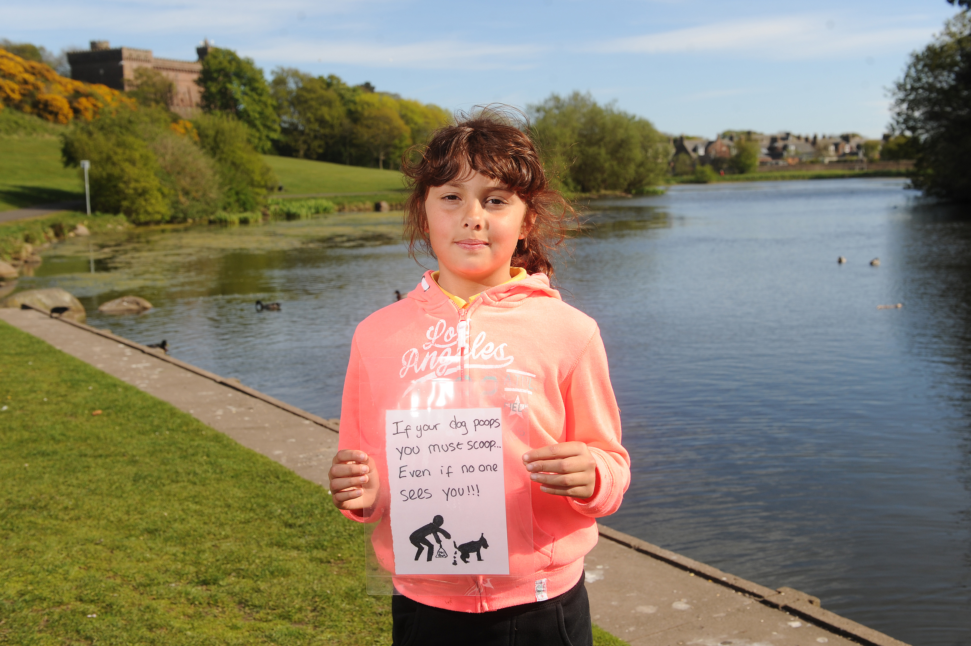 Chloe Todd, young eco-warrior and Keptie Friends member, with her poster.