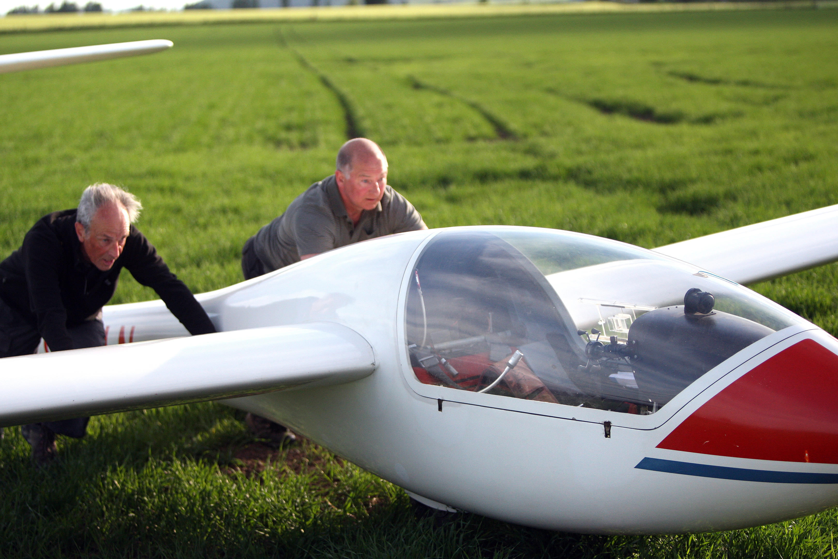 Members of the Bowland Forest Gliding Club help recover the glider.