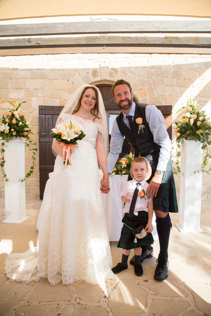 Mel and Craig with son William on their wedding day