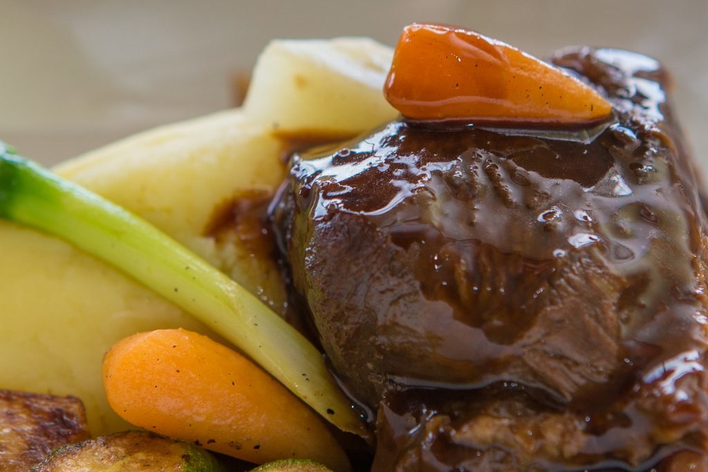 Slow Brazed Ox Cheek with Mashed Potato, Spring Veg and Red Wine Sauce 