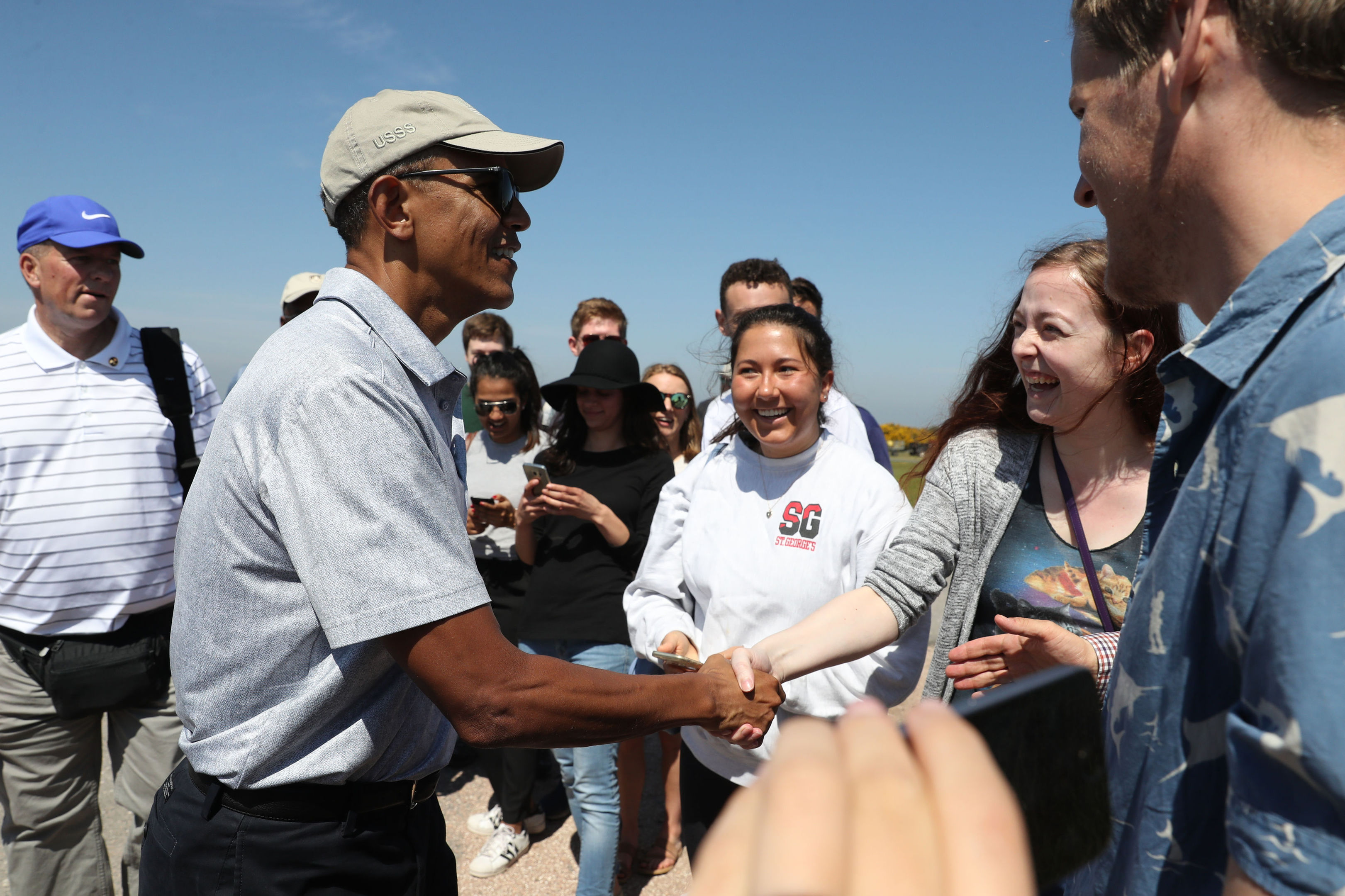 Obama mingles with the St Andrews crowd.