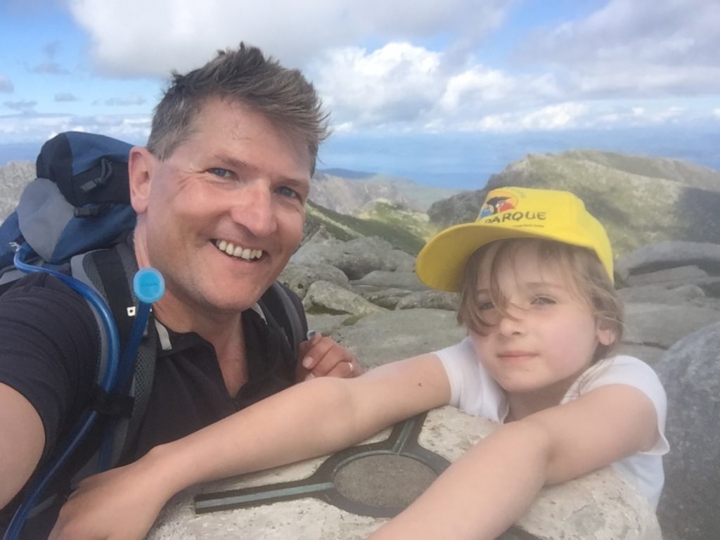 Robin on top of Goatfell on Arran with his daughter Tara.