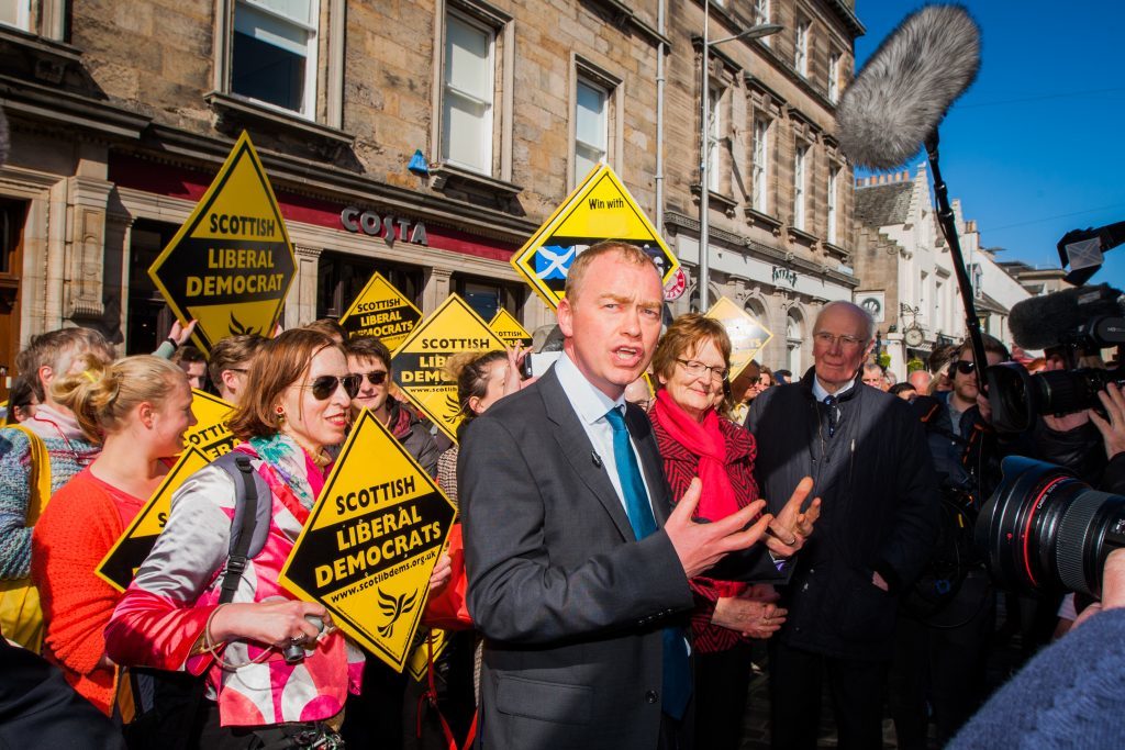Tim Farron (front) alongside Elizabeth Richies and Sir Menzies Campbell. Market Street, St Andrews.