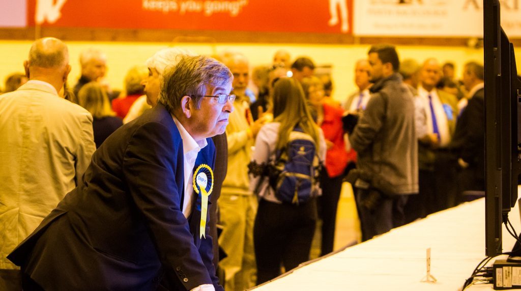 An SNP supporter seeing blue on the screen.