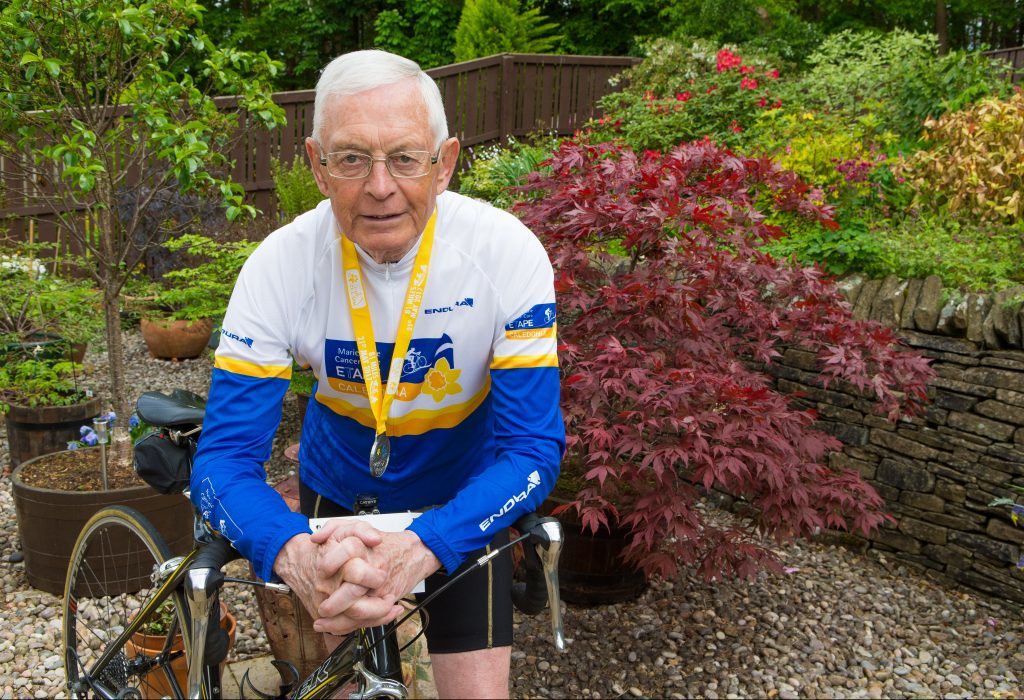 John McNally with his Etape Caledonia finisher's medal.