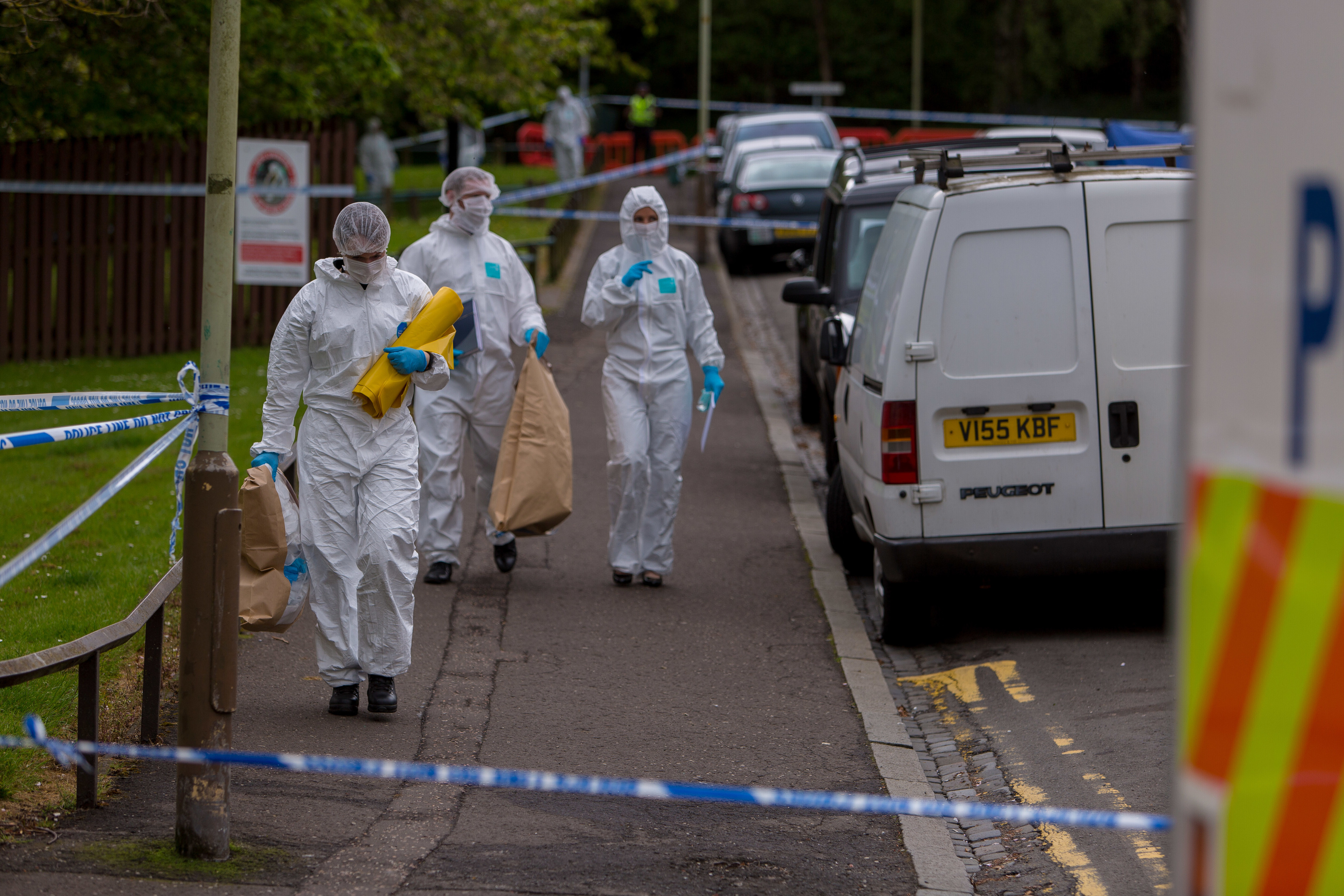 Forensic officers in Lawton Road.