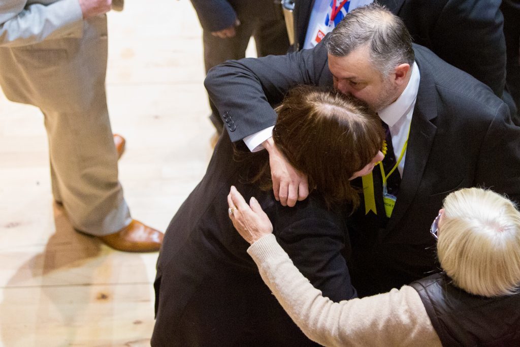 Vikki Wilton, SNP, (left) received hugs from supporters.