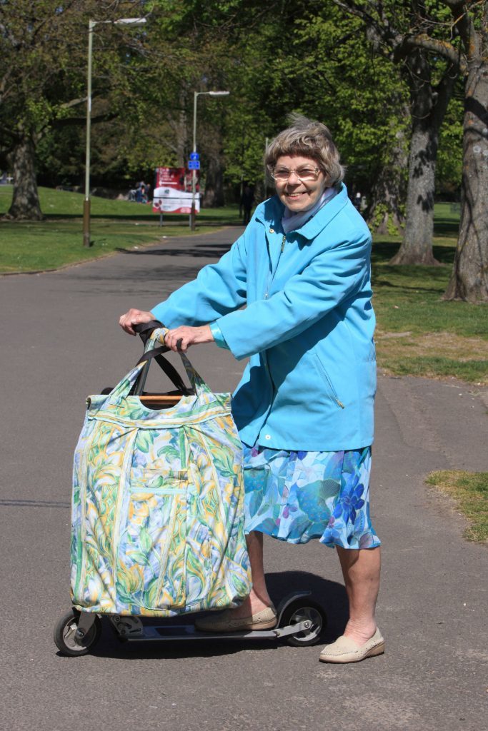 Barbel balances shopping bags on her scooter - the more the better!