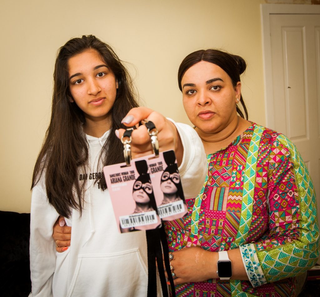 Saima Shah with daughter Muminah (Mona) Shah (aged 14), holding their Ariana Grande tickets from the day of the attack.