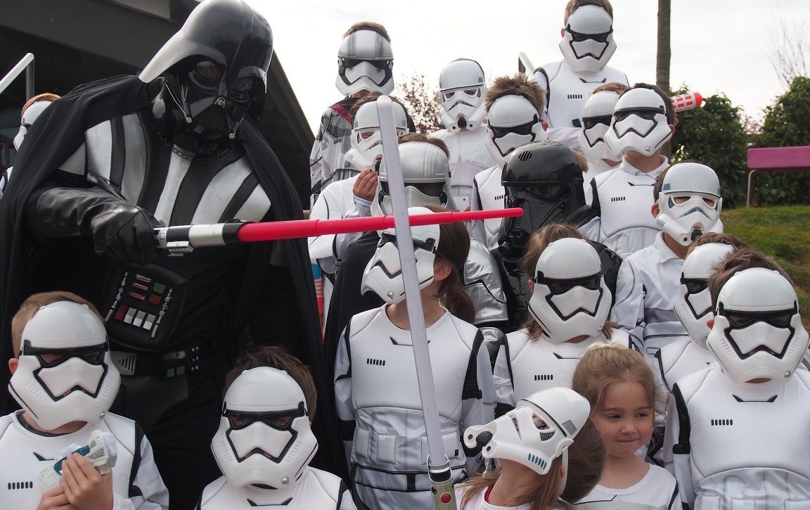 Darth Vader (head teacher Stuart Clyde) greets his army of diminutive stormtroopers at The Community School of Auchterarder.