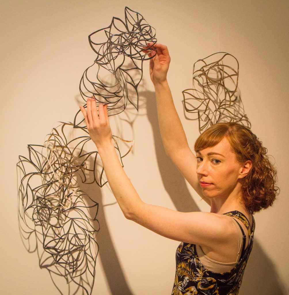 Joanne Hall, 29 with her piece Traces.