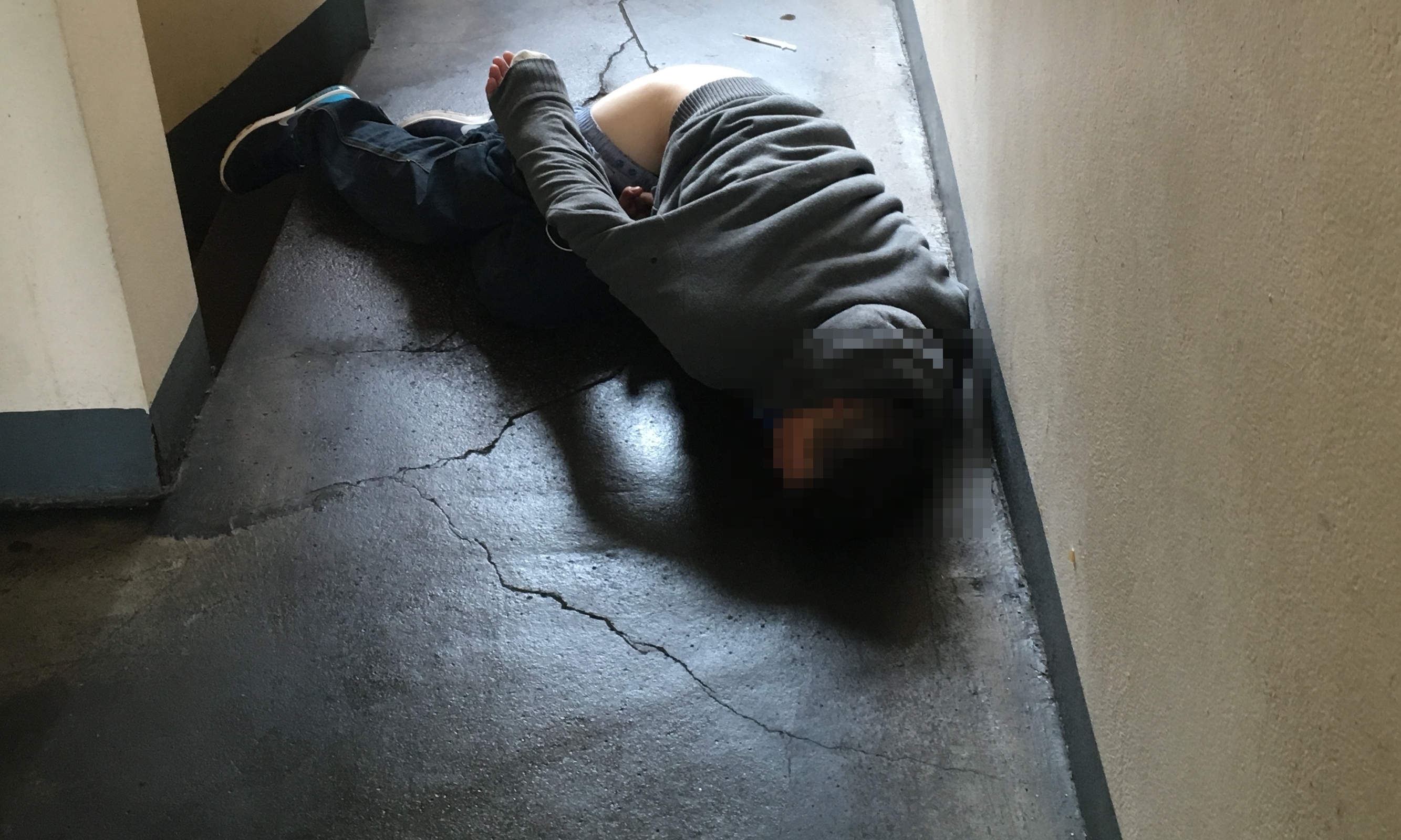 A drug addict unconscious in Dundee’s Bell Street car park in 2017.