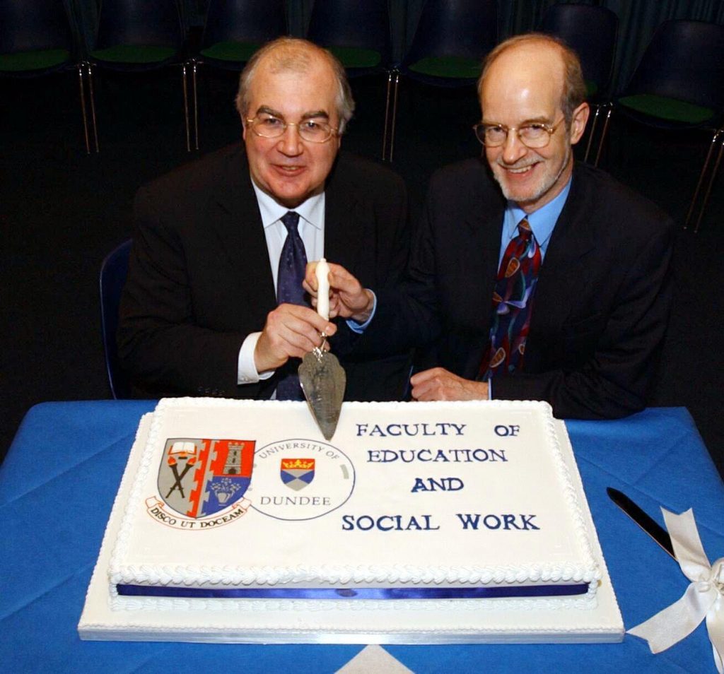 Sir Alan Langlands left) Principal of Dundee University and Professor Ron Elder [former Vice Principal of Northern College and Dean of the New Faculty of Education and Social Work] with historic trowel at a ceremony in 2001