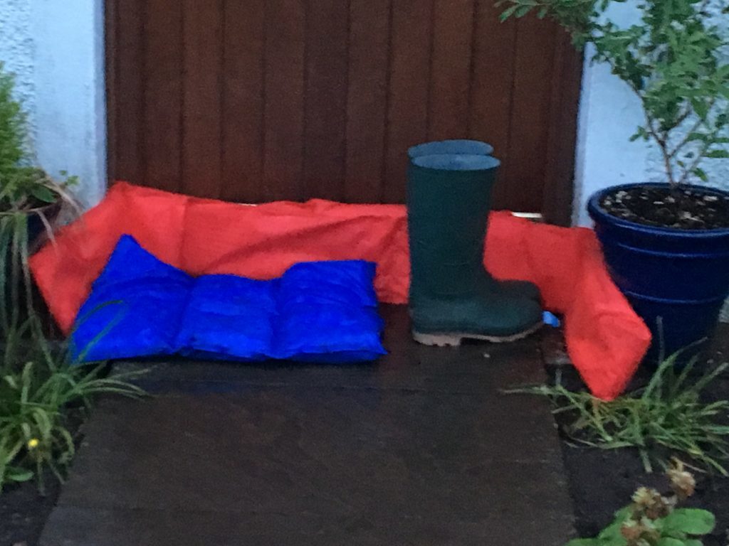 Emergency flood defences at front doors in Ceres Road, Cupar