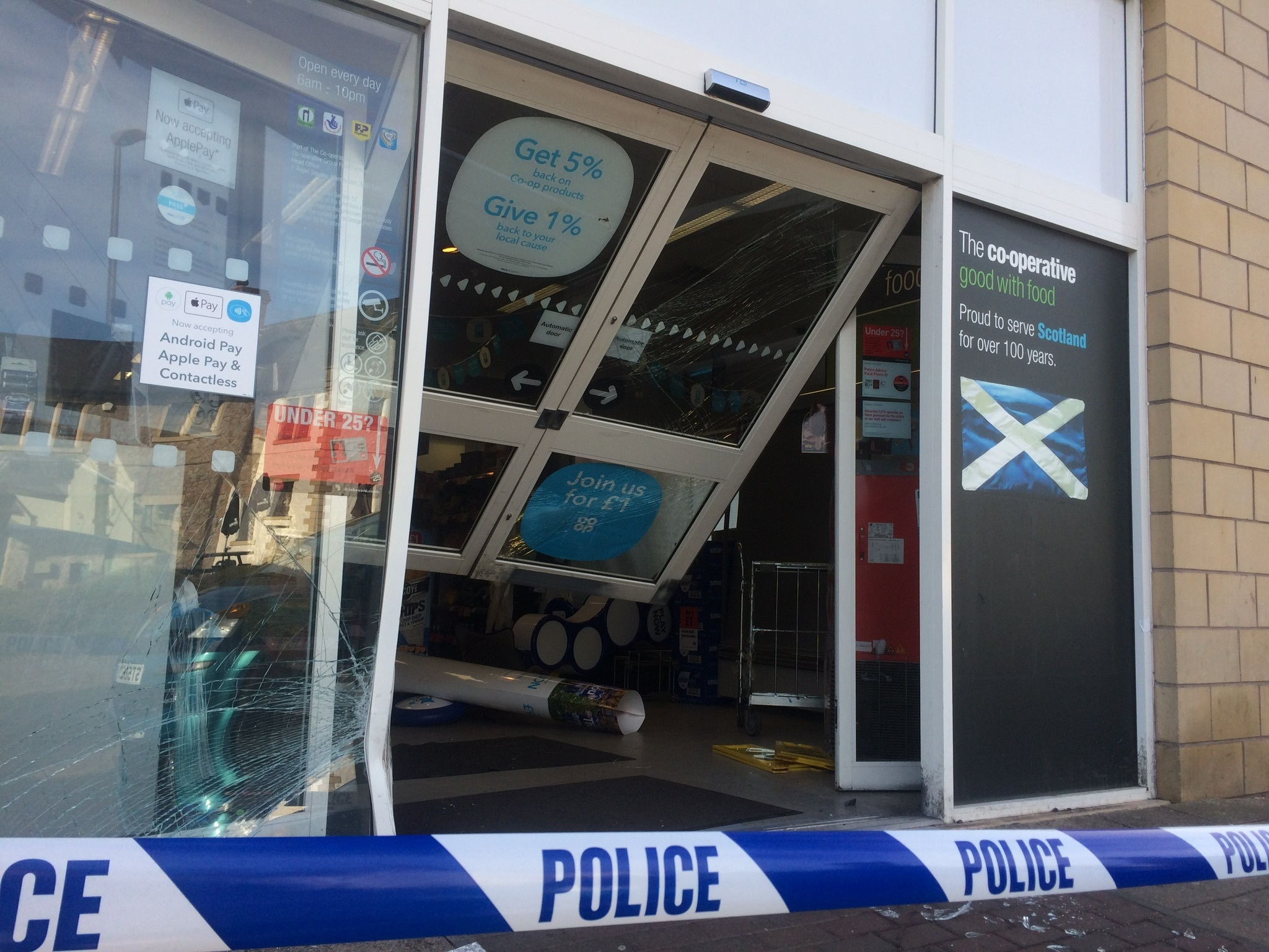 The smashed door at Co-op in Panmurefield.