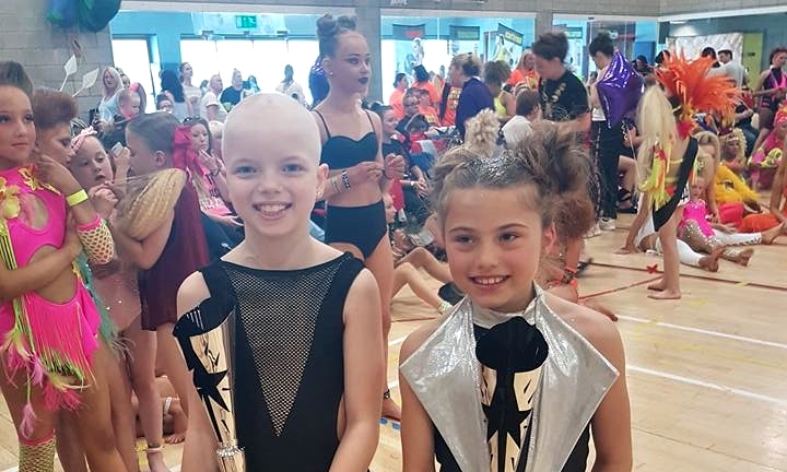Lily, left, with a fellow dancer at the event.