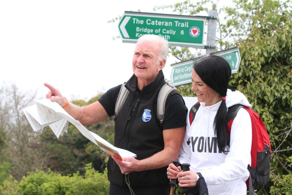 Mike Mooney and Gayle Ritchie doing a spot of map reading ahead of the Yomp.