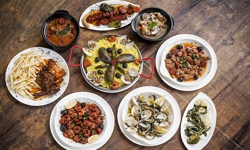mixed portuguese traditional rustic tapas food gourmet selection on wood table