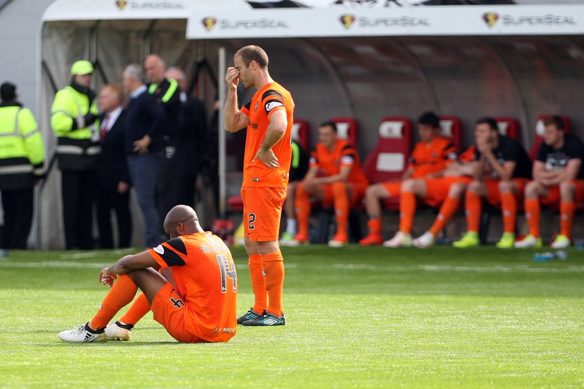Dundee United players react to the Hamilton loss in the 2017 play-off finals.