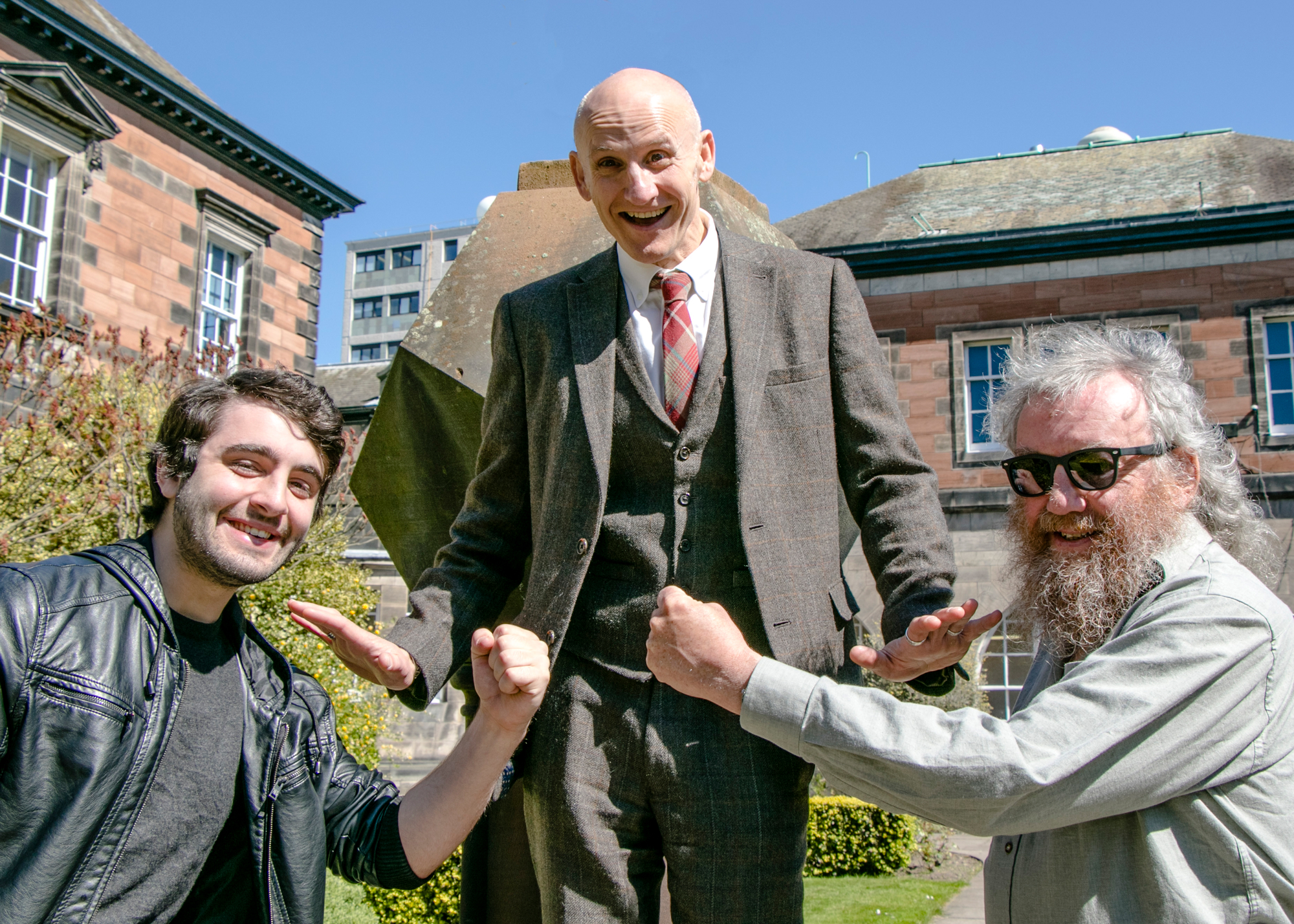 Professor Fordyce Davidson (middle) keeps student Rory McDowell (left) and graduate Iain Brodie (right) at bay ahead of next Saturday's event