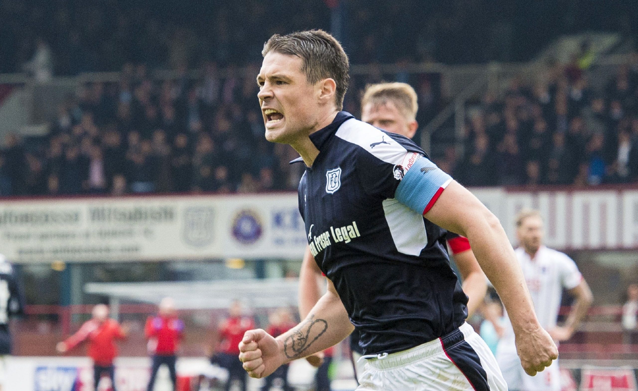 Darren O'Dea celebrates his goal.