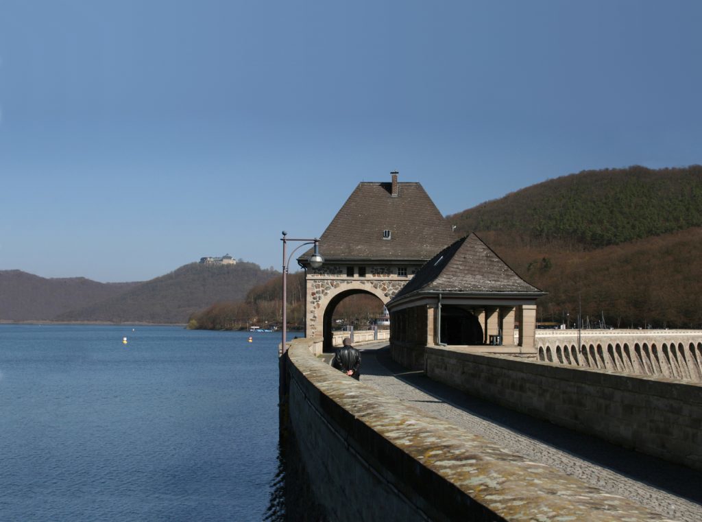 Reservoir Edersee and dam with the castle of Waldeck in the background. 