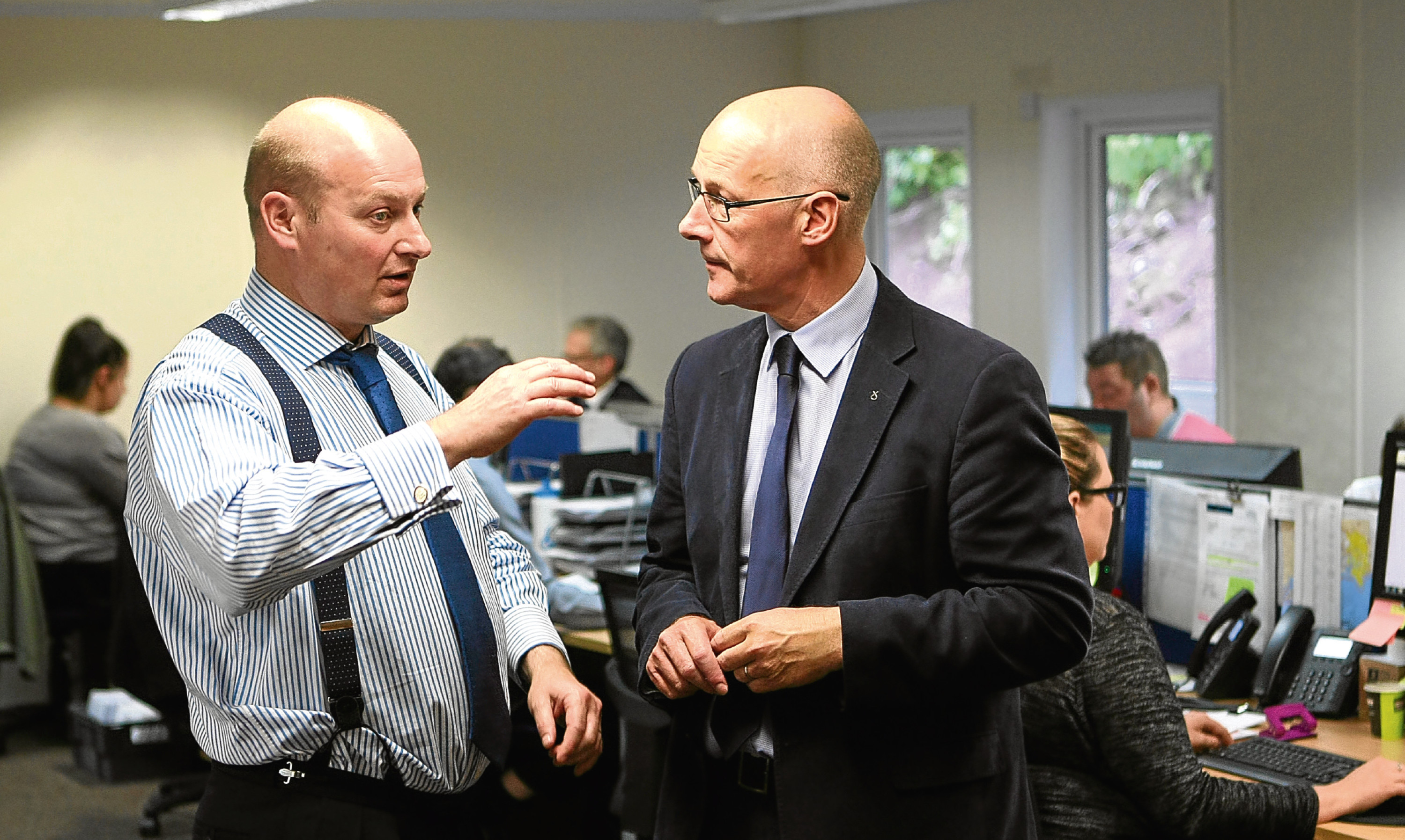 Castle Water CEO John Reynolds chats with Deputy First Minister John Swinney during a visit to the groups Blairgowrie headquarters last year.