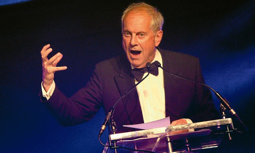 Gyles Brandreth takes charge at the 2016 Courier Business Awards. He is to return for 2017.