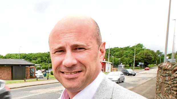 Angus children and learning convener, Councillor Derek Wann.