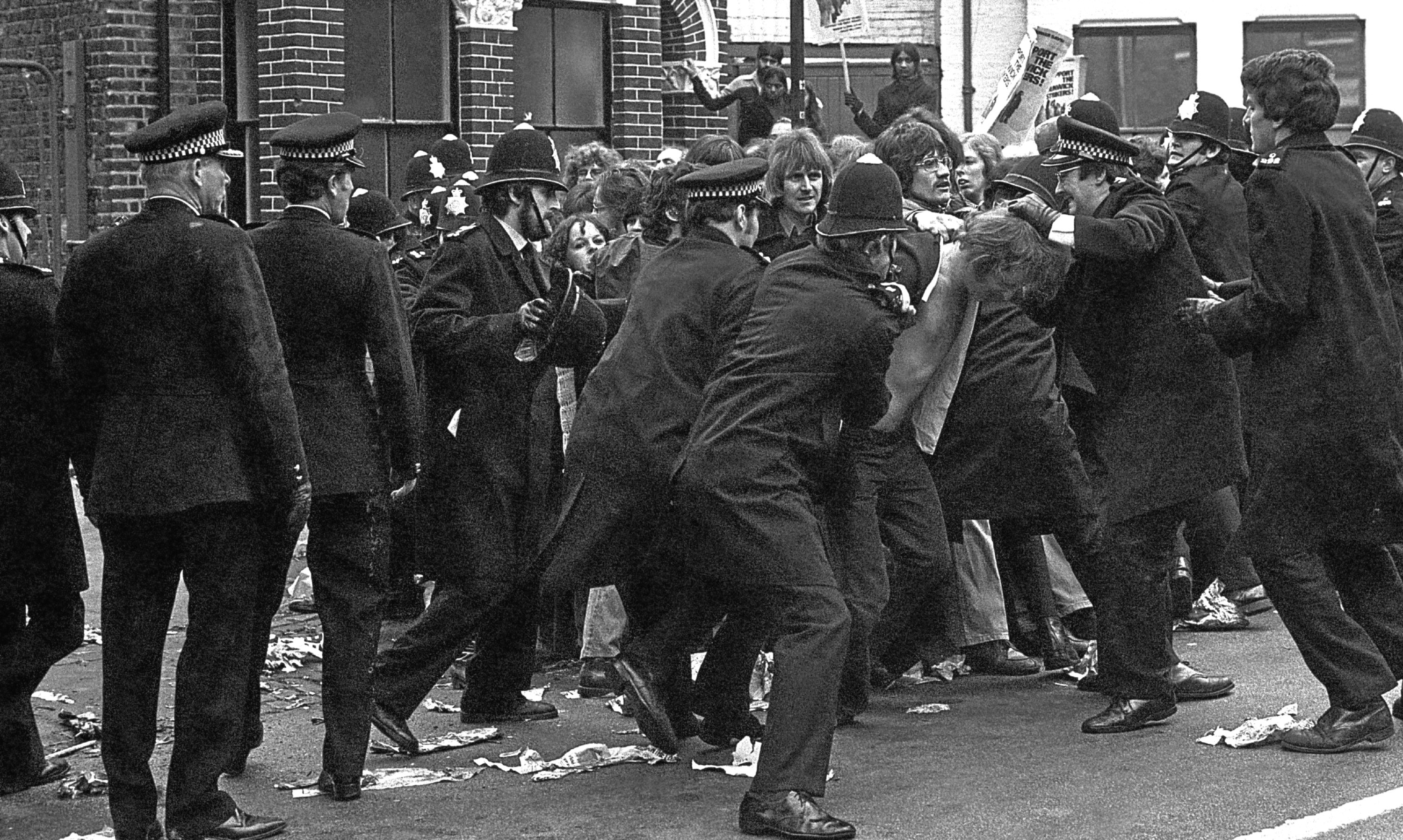 Police restrain pickets at the Grunwick factory in London in June 1977.