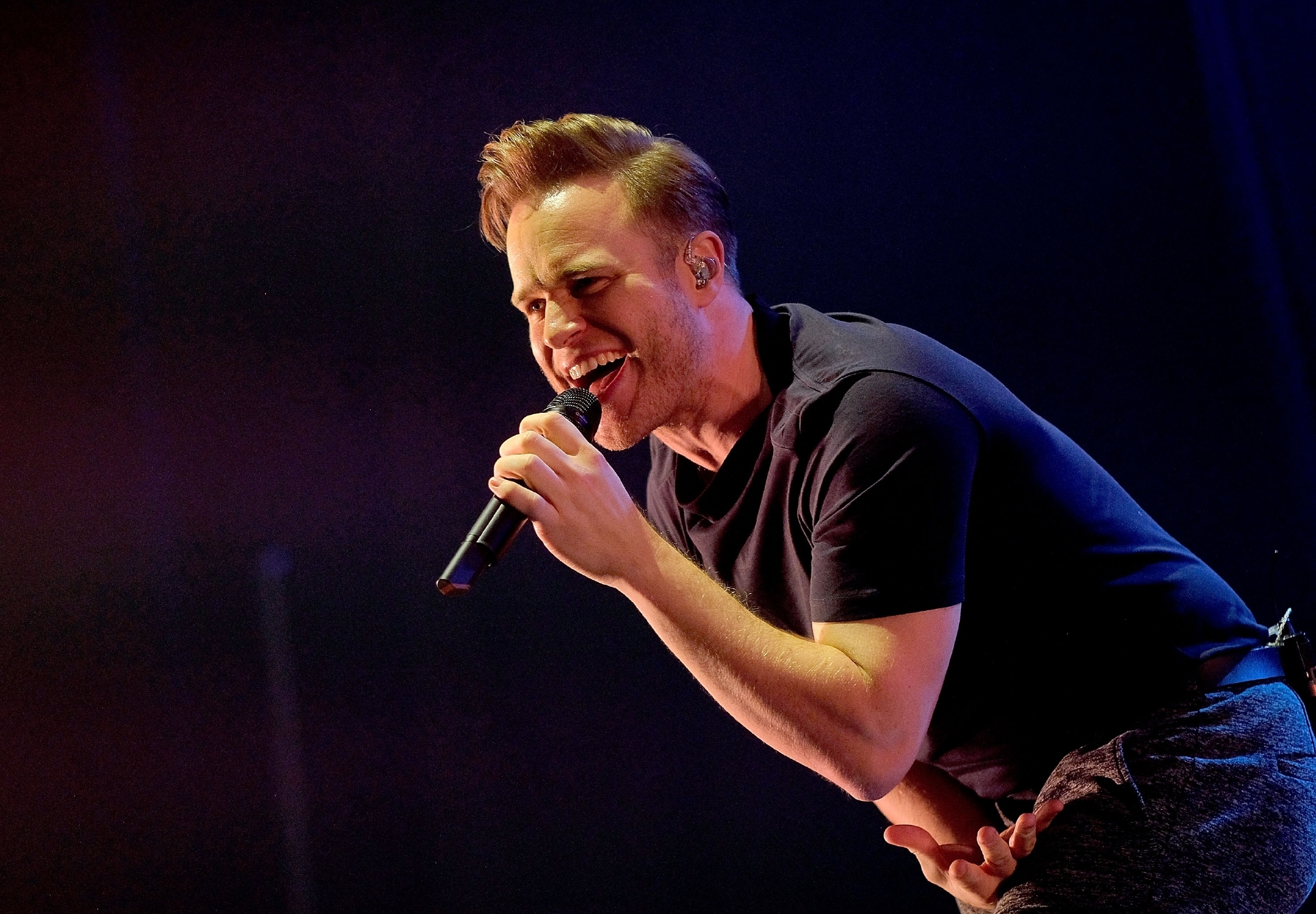 Olly Murs performs on stage.