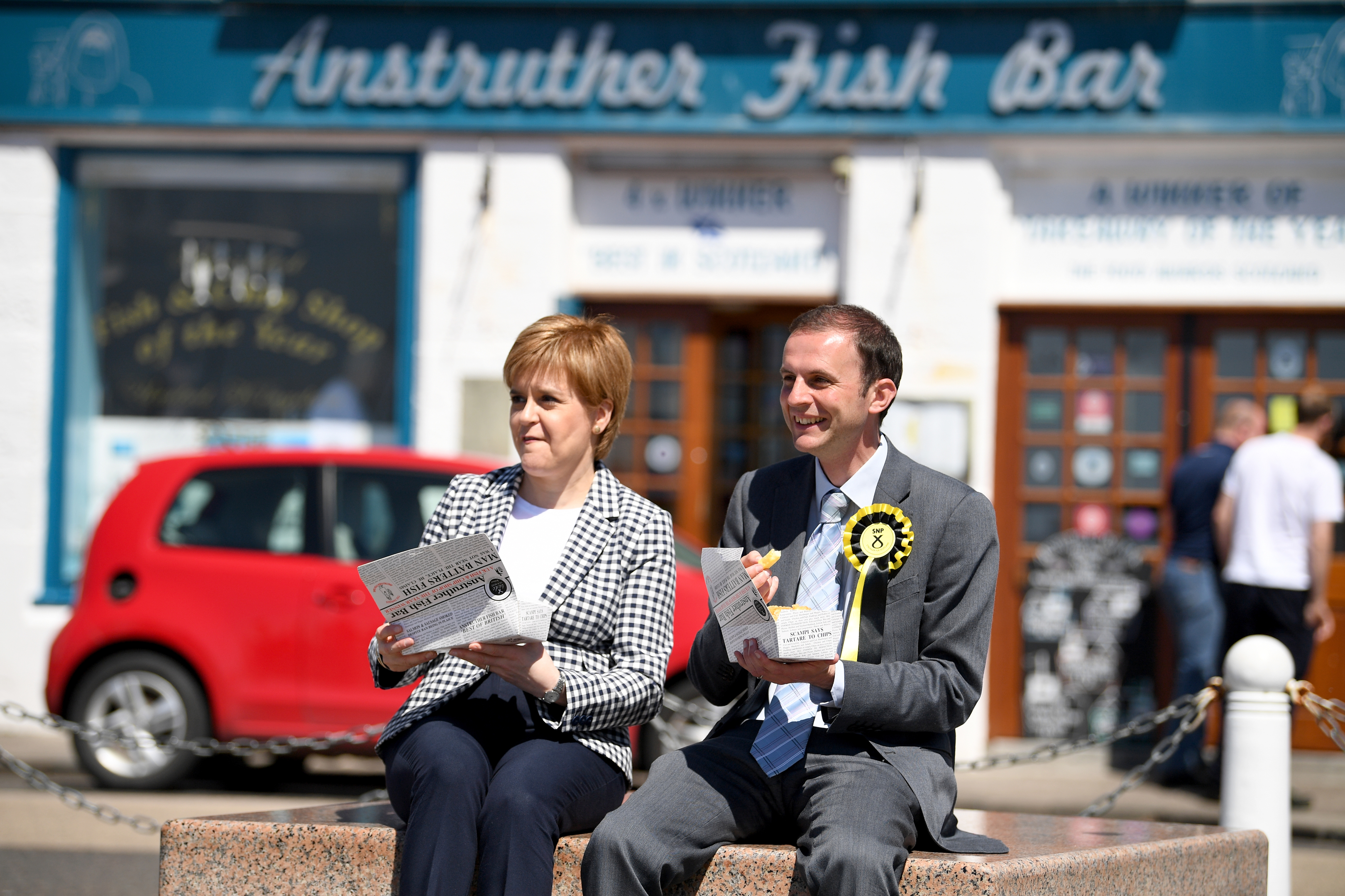 SNP leader Nicola Sturgeon eats chips as she campaigns with Stephen Gethins in Anstruther ahead of last year’s general election.