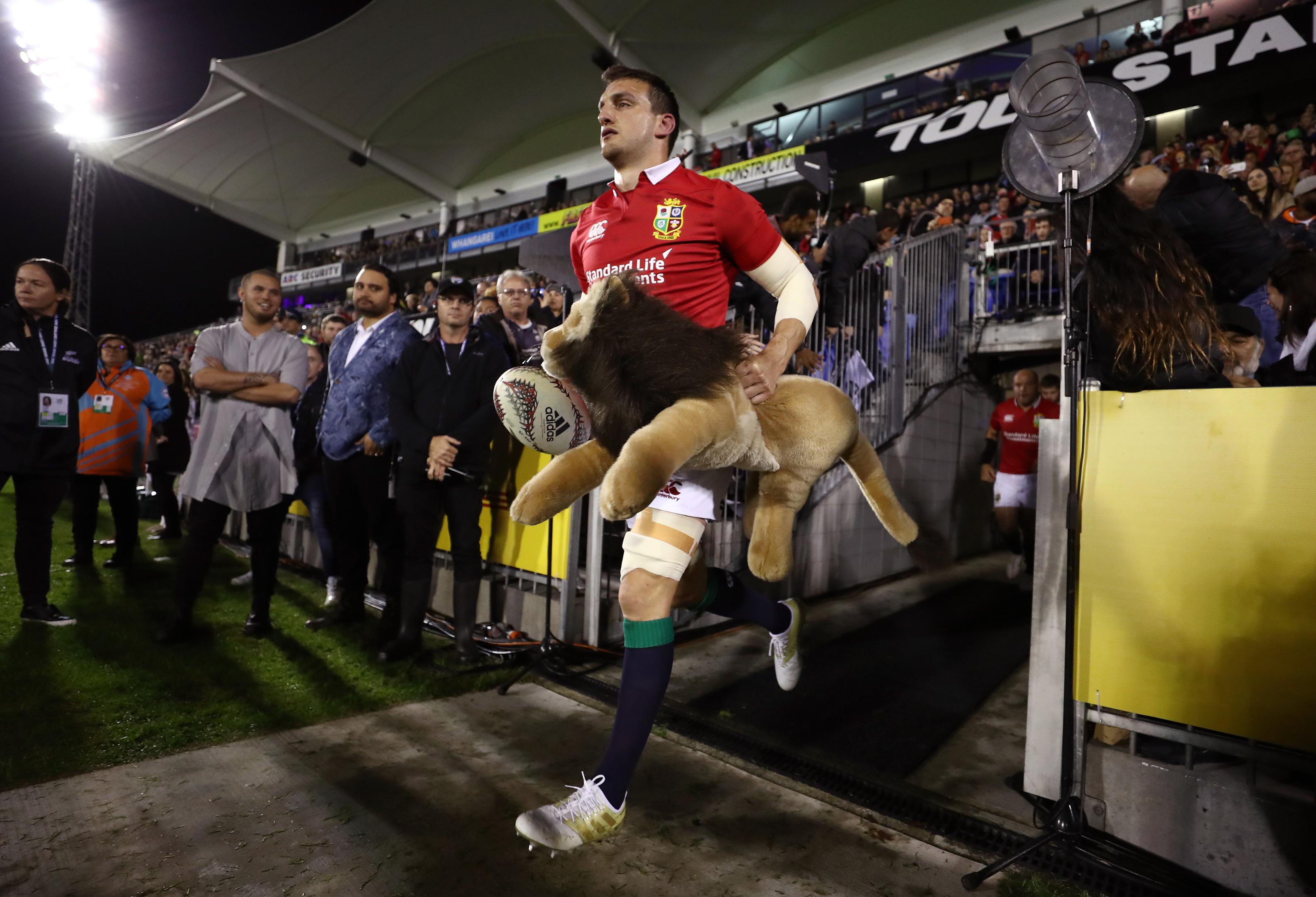 Captain Sam Warburton leads out the Lions for the opening match against the New Zealand Provincial Barbarians.