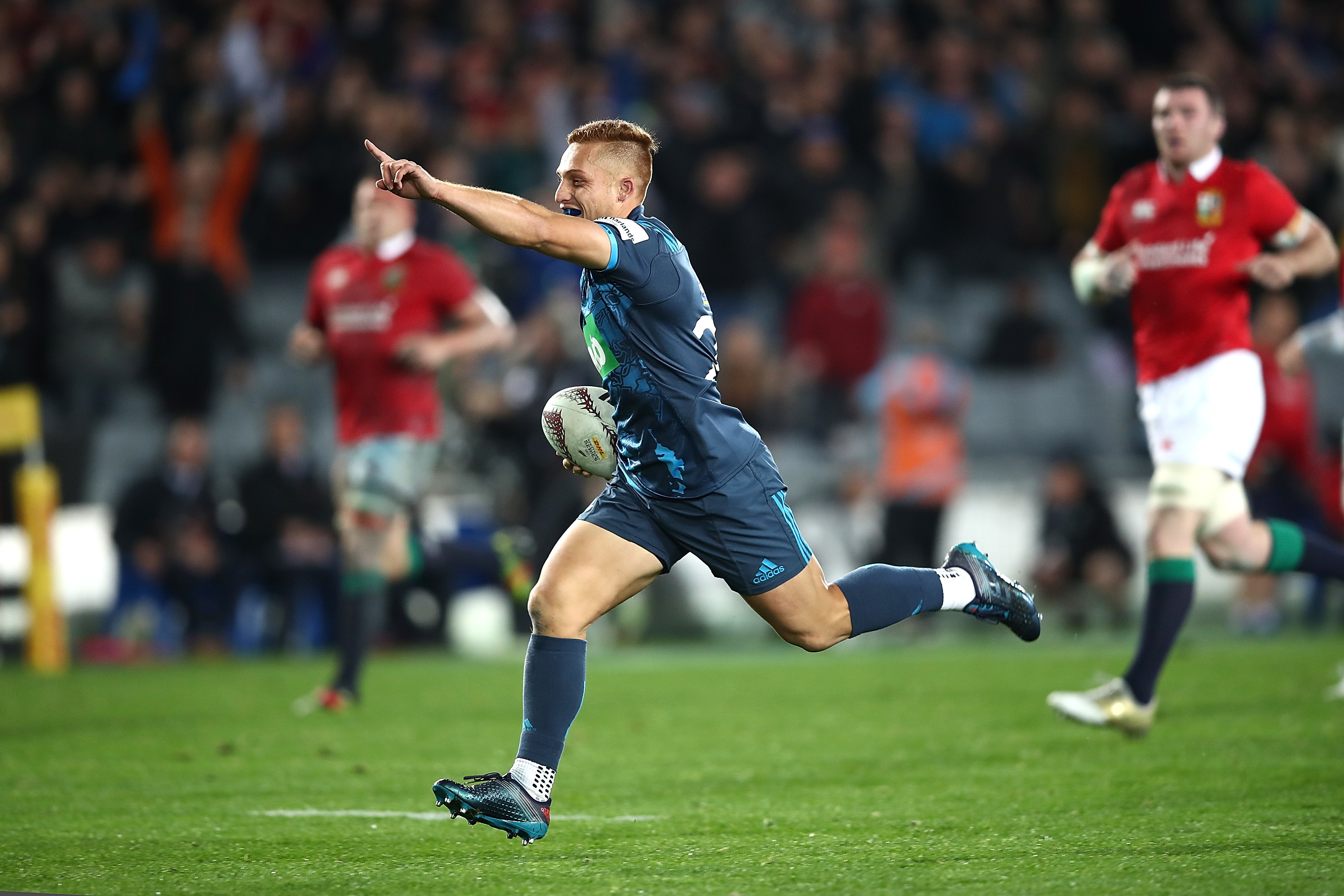 Ihaia West of the Blues celebates as he runs in to score the clinching try for the Blues against the Lions.