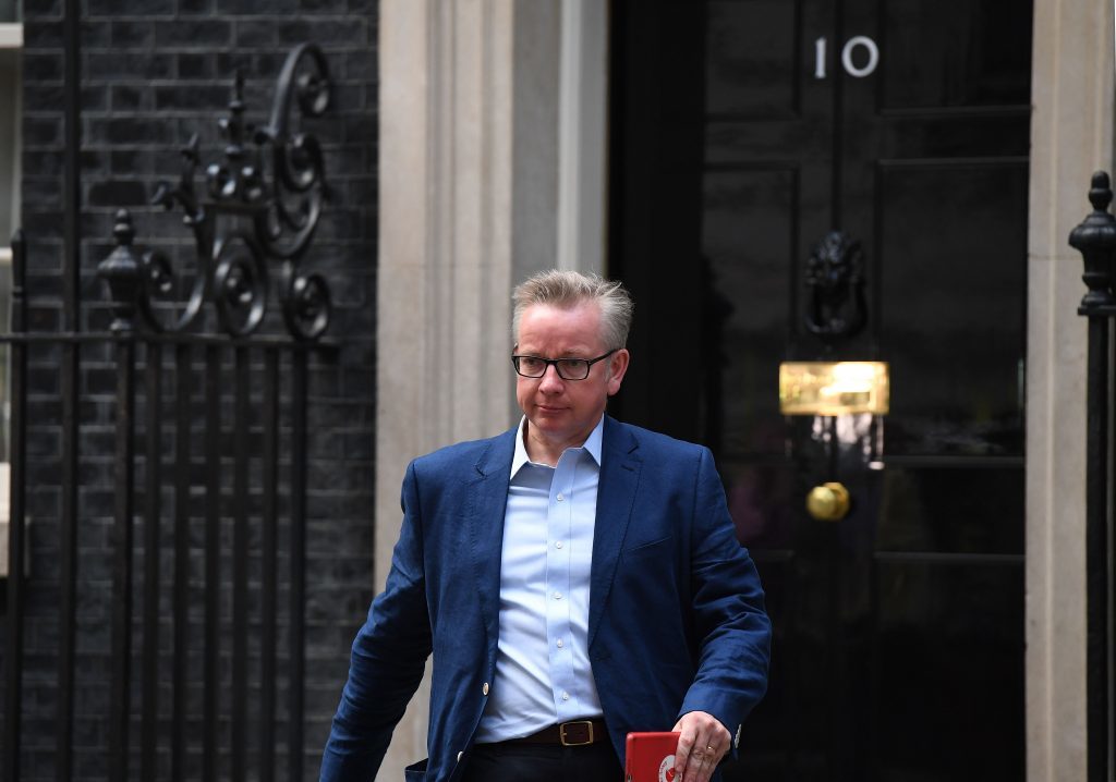 Michael Gove leaves 10 Downing Street after being brought back into the Cabinet.