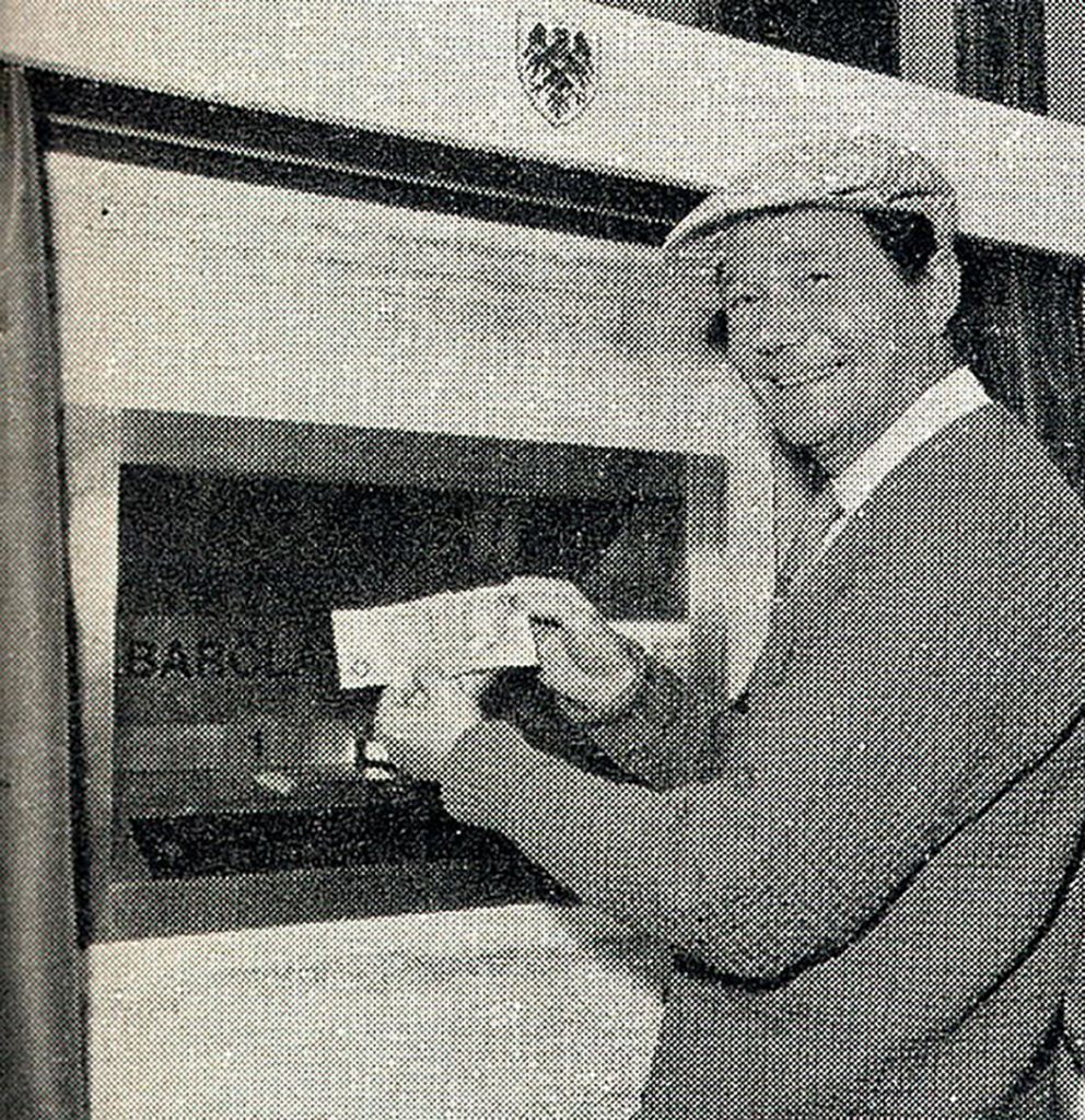 Actor Reg Varney at the official opening of the worlds first ATM, installed at Barclays in Enfield, London on June 27 1967.