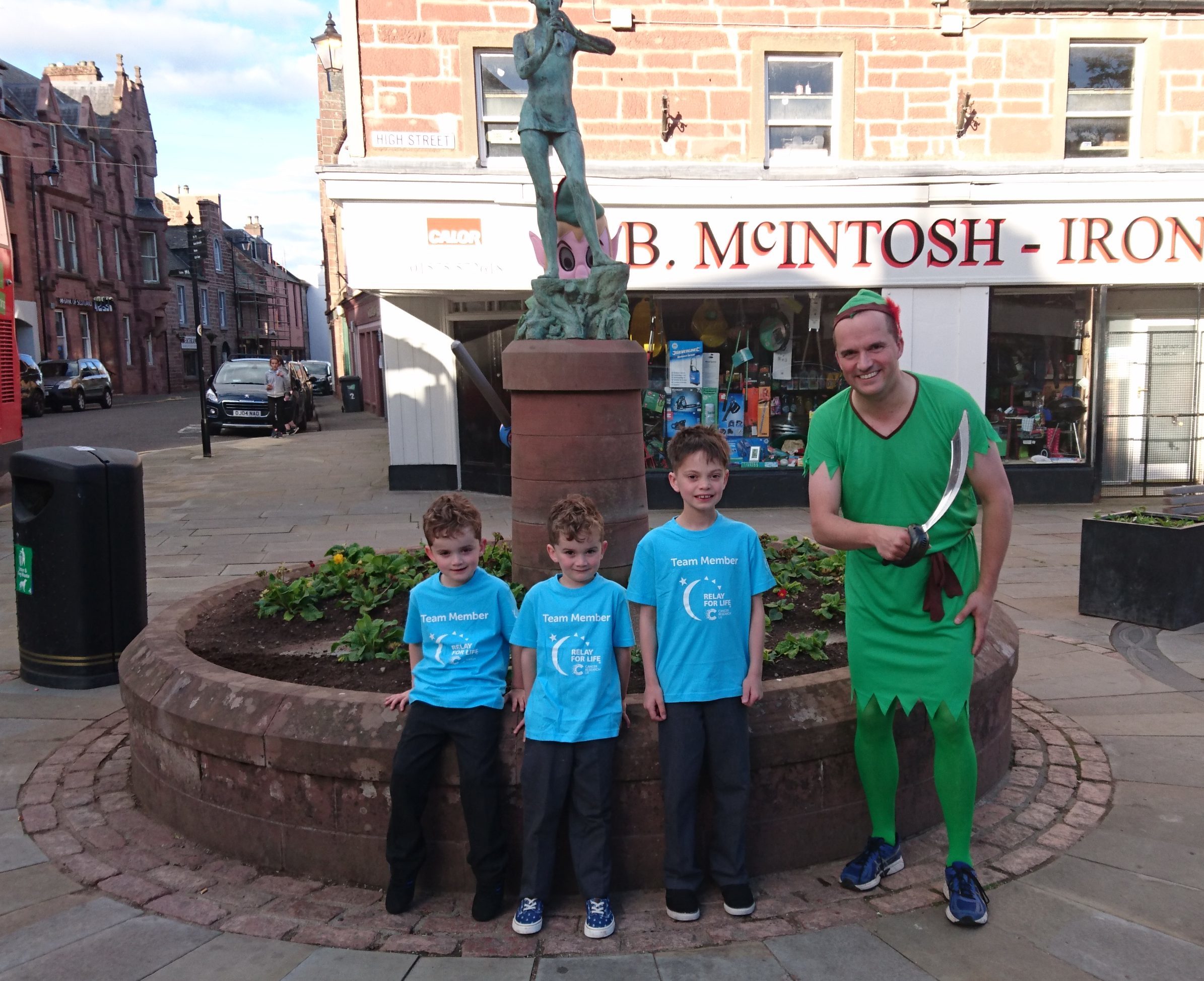 Relay for Life treasurer Scott Kennedy with his children  Gregor 9, Fraser, 6 and Struan, 6.