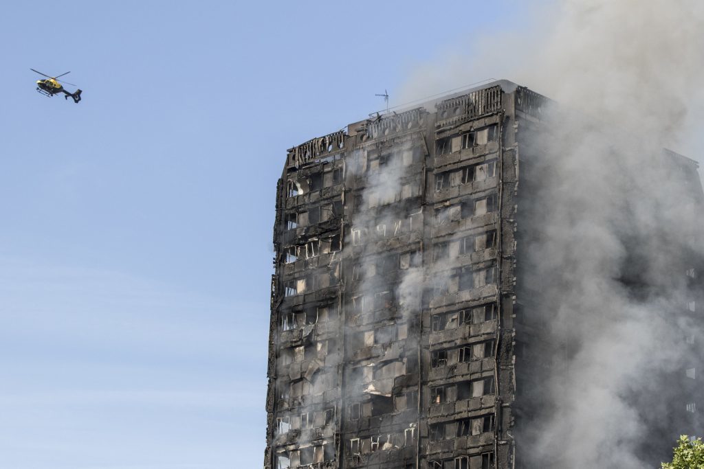 Smoke billows from a fire that has engulfed the 27-storey Grenfell Tower.