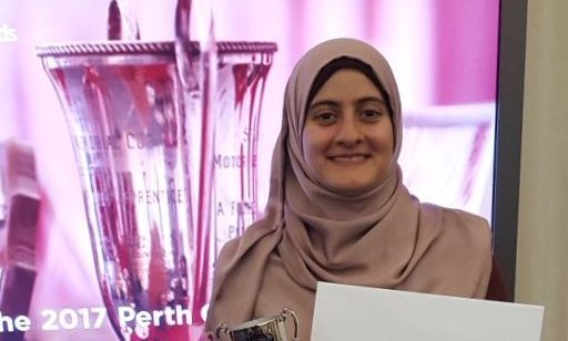 Iman Sari with her award from Perth College