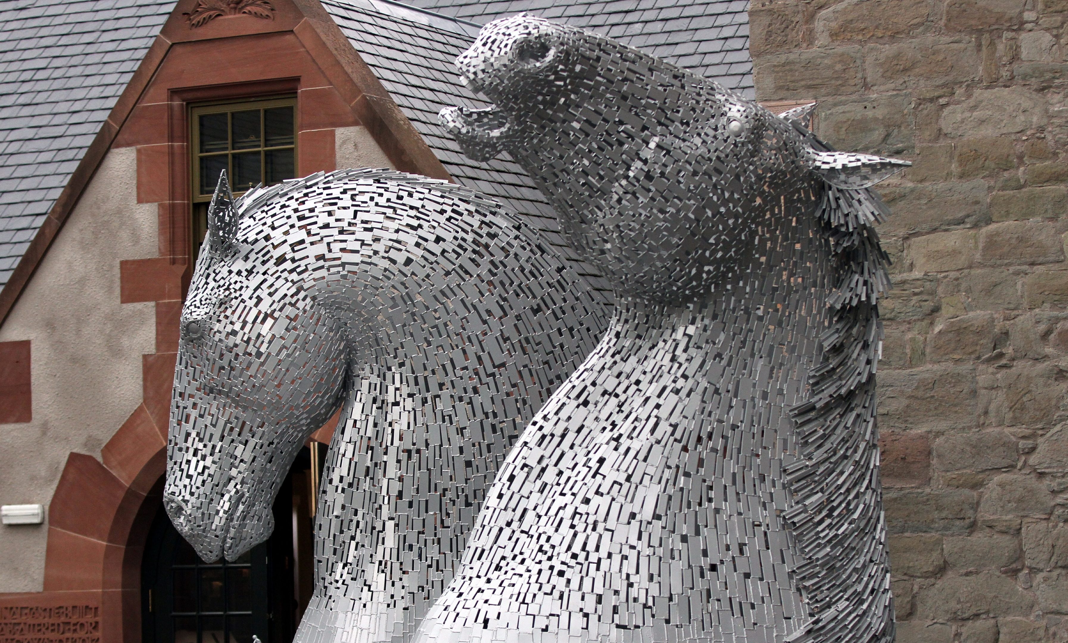 The mini Kelpies on display outside the Black Watch Museum in Perth.