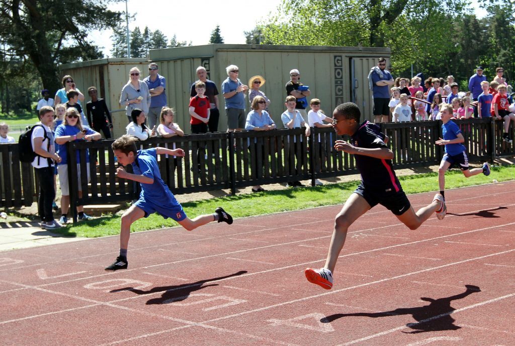 Lucas Goff wins the P6 boys 4 x 100m metres relay for Forthill Primary.