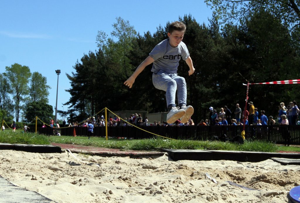 A youngster at the long jump.
