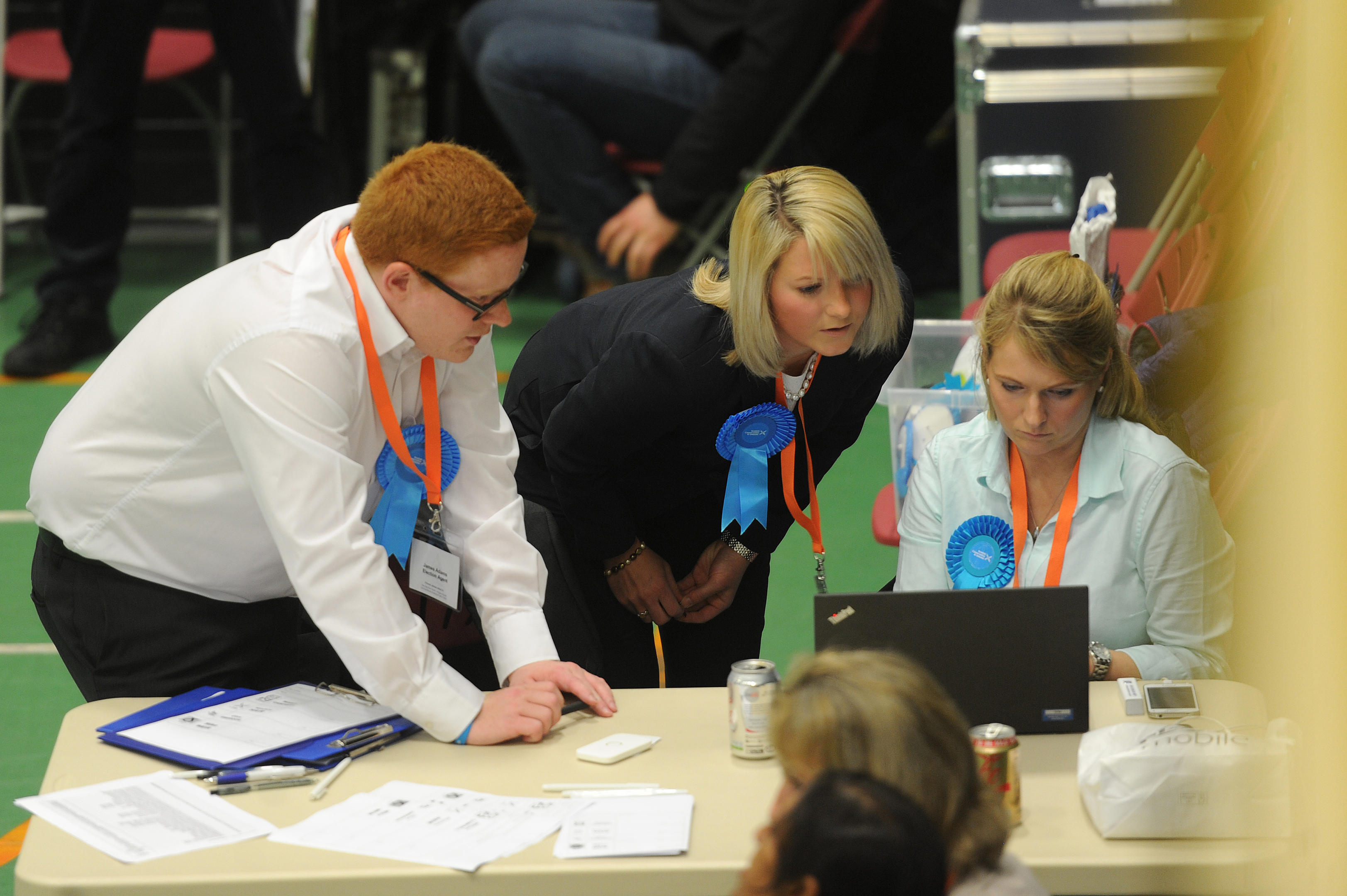 Conservative candidate Kirstene Hair checks the early papers